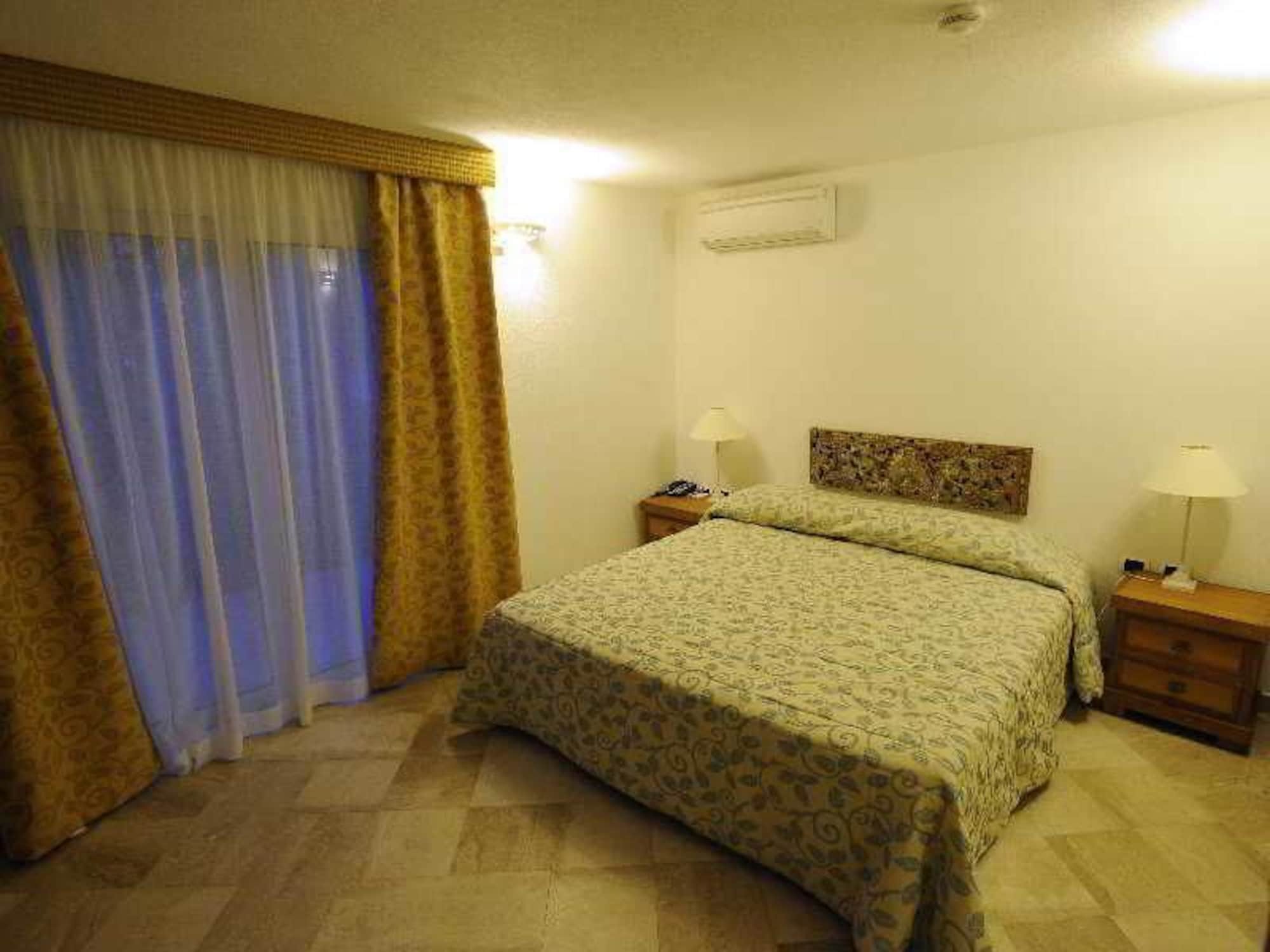 Residence Living Poltu Quatu 阿尔扎凯纳 外观 照片